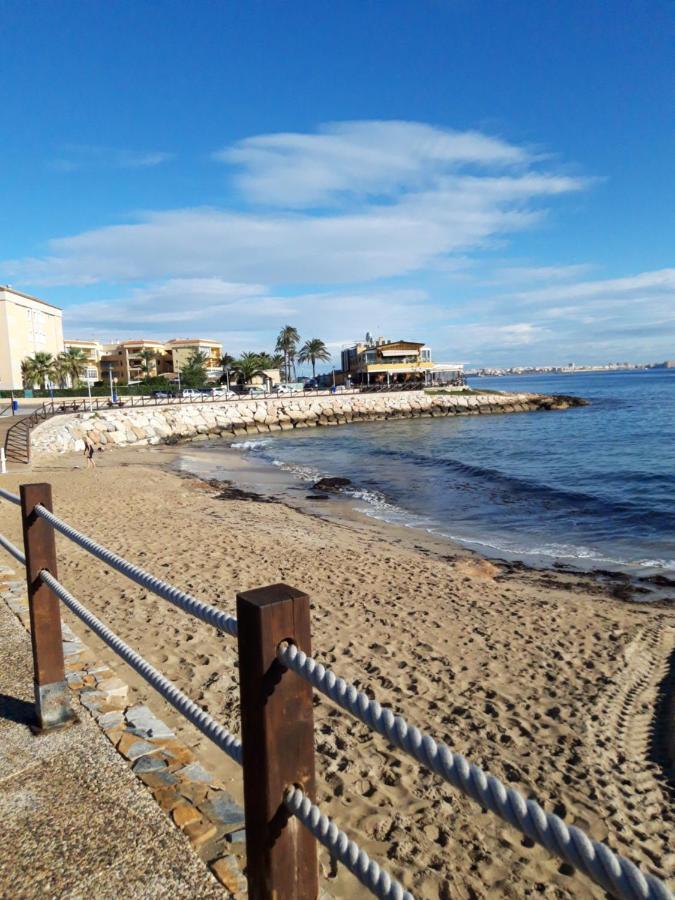 Punta Prima Pleasure With Private Parking In A Gated Community Close To The Beach ตอร์เรเวียคา ภายนอก รูปภาพ